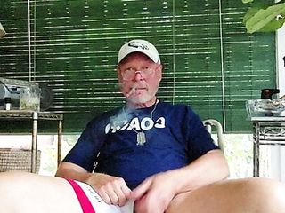 Coach After Practice Enjoying A Cigarvand Getting Off free video